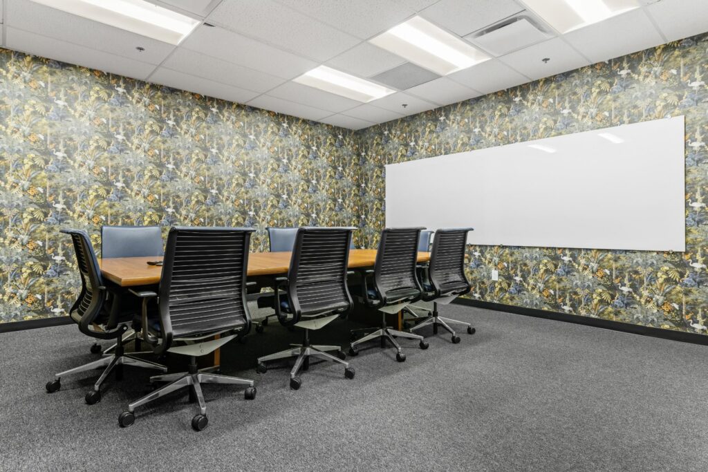 Conference room with whiteboard at 1950 Franklin in Oakland