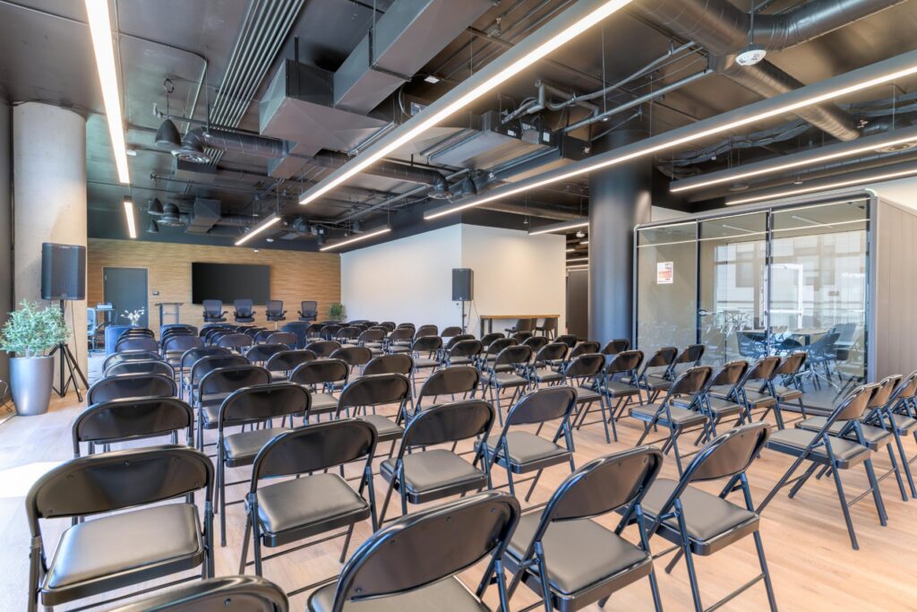 Event space set theater style at STAK Space, 1920 Broadway, Oakland