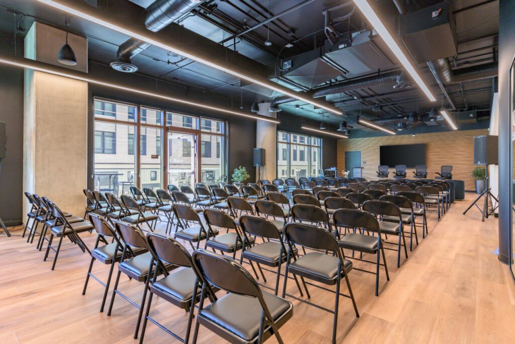 Event space with rows of seating at STAK Space, 1920 Broadway, Oakland