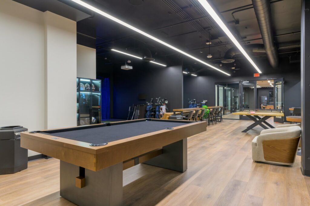 Game area with pool table at STAK Space, 1920 Broadway, Oakland