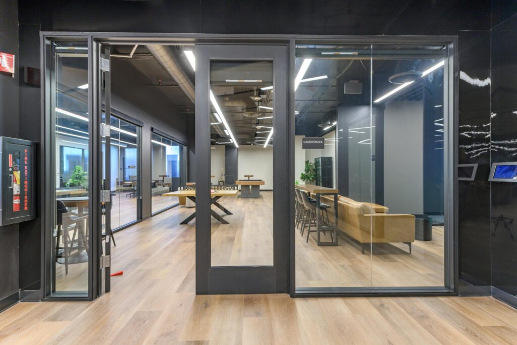 Glass office corridor at STAK Space, 1920 Broadway, Oakland