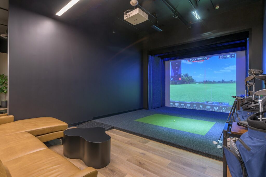 Golf simulator bay at STAK Space, 1920 Broadway, Oakland