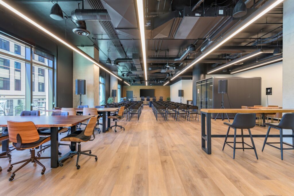 Long coworking floor with work tables at STAK Space, 1920 Broadway, Oakland