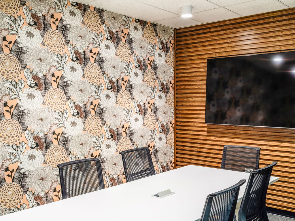 Meeting room with floral wallpaper at 1950 Franklin in Oakland