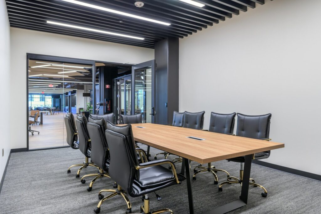 Meeting room with oak table at STAK Space, 1920 Broadway, Oakland
