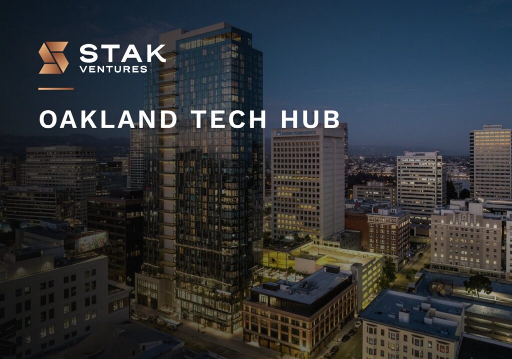 Oakland tech hub: 1900 Broadway tower at night in Uptown Oakland