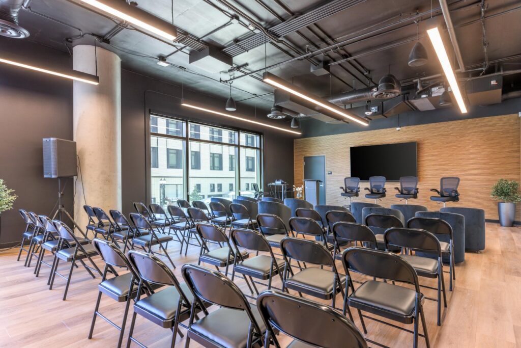 Presentation setup with screen at STAK Space, 1920 Broadway, Oakland
