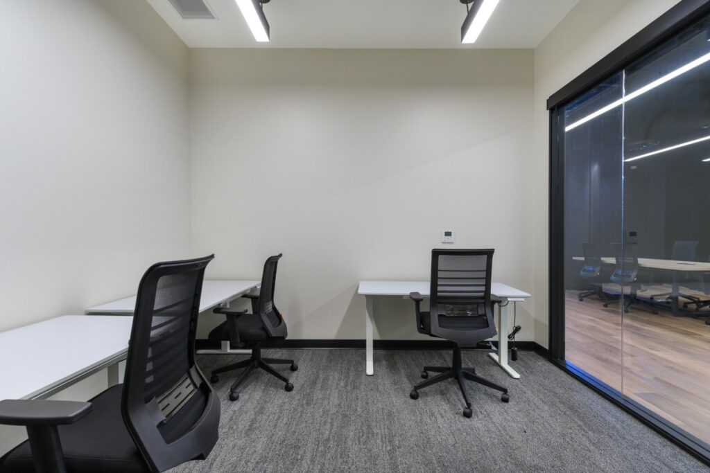 Private office with desks at STAK Space, 1920 Broadway, Oakland