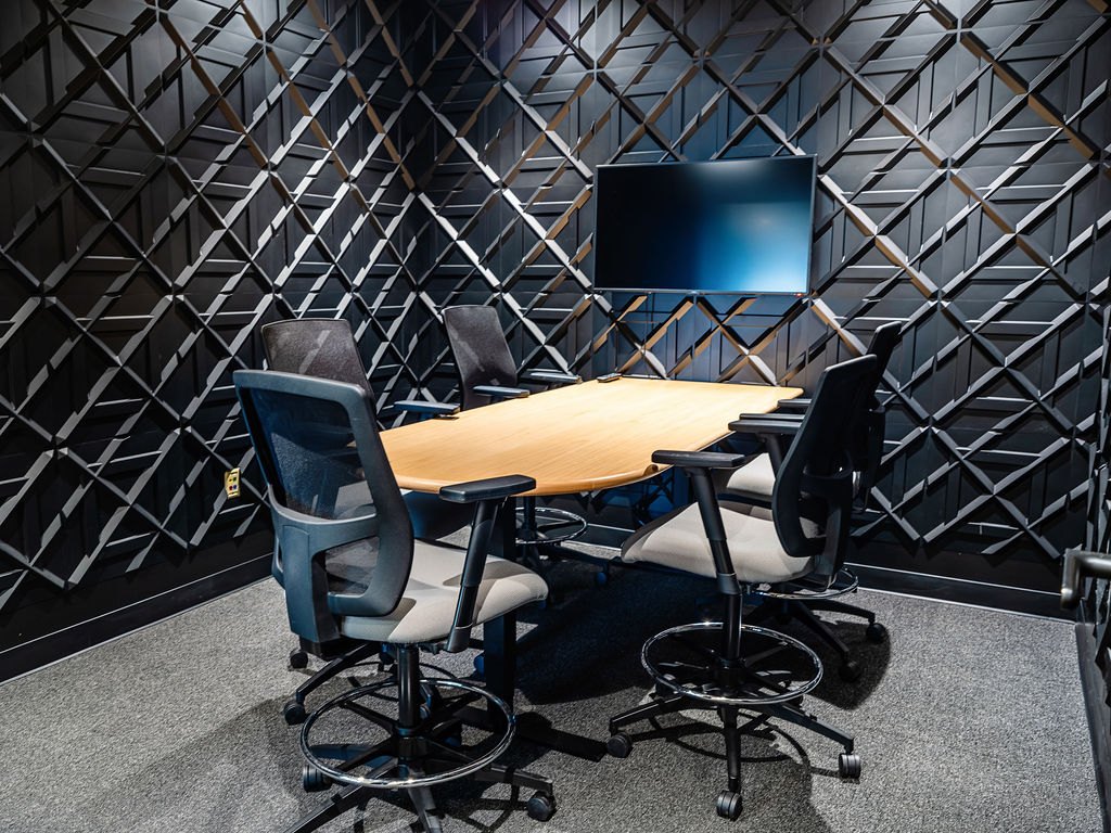 Small meeting room with textured walls at 1950 Franklin in Oakland